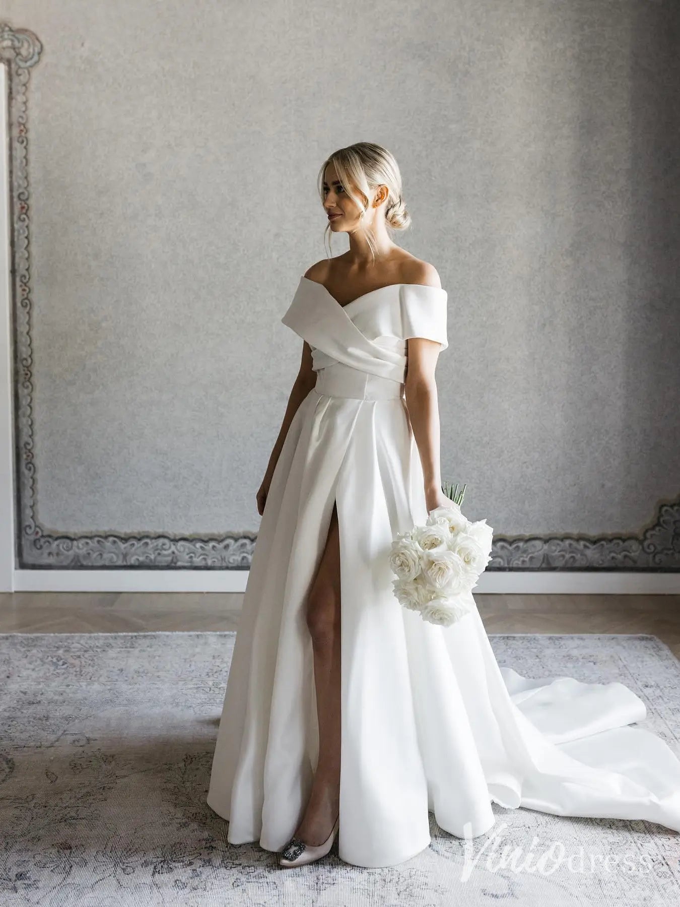 Modern Satin Wedding Dress with Off-Shoulder Wrap Bodice, High Slit and Cathedral Train – MS106