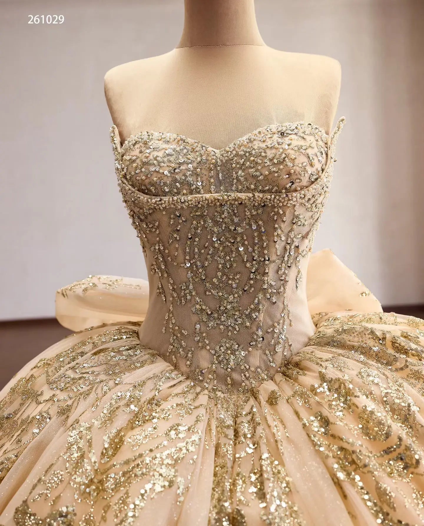 Regal Beaded Quinceañera Ball Gown with Sweetheart Corset, Ruffled Hem and Oversized Back Bow - 261029