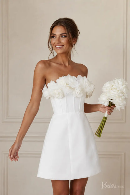 White strapless mini wedding dress with a structured corset bodice and handcrafted 3D floral neckline.
