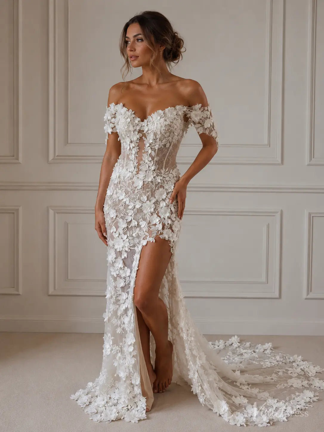 Off-shoulder boho wedding dress with 3D floral appliqués, a plunging sweetheart neckline, basque waist, and high slit.