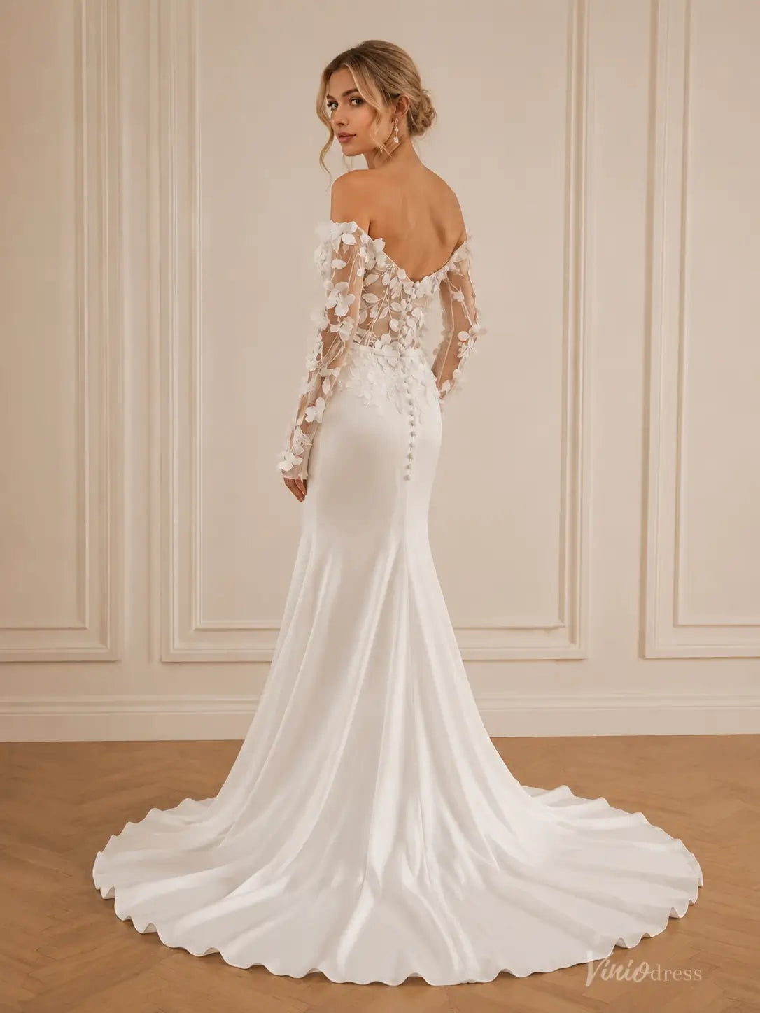 Ivory sheath wedding dress with 3D lace long sleeves, sweetheart neckline, and a satin skirt with a court train.