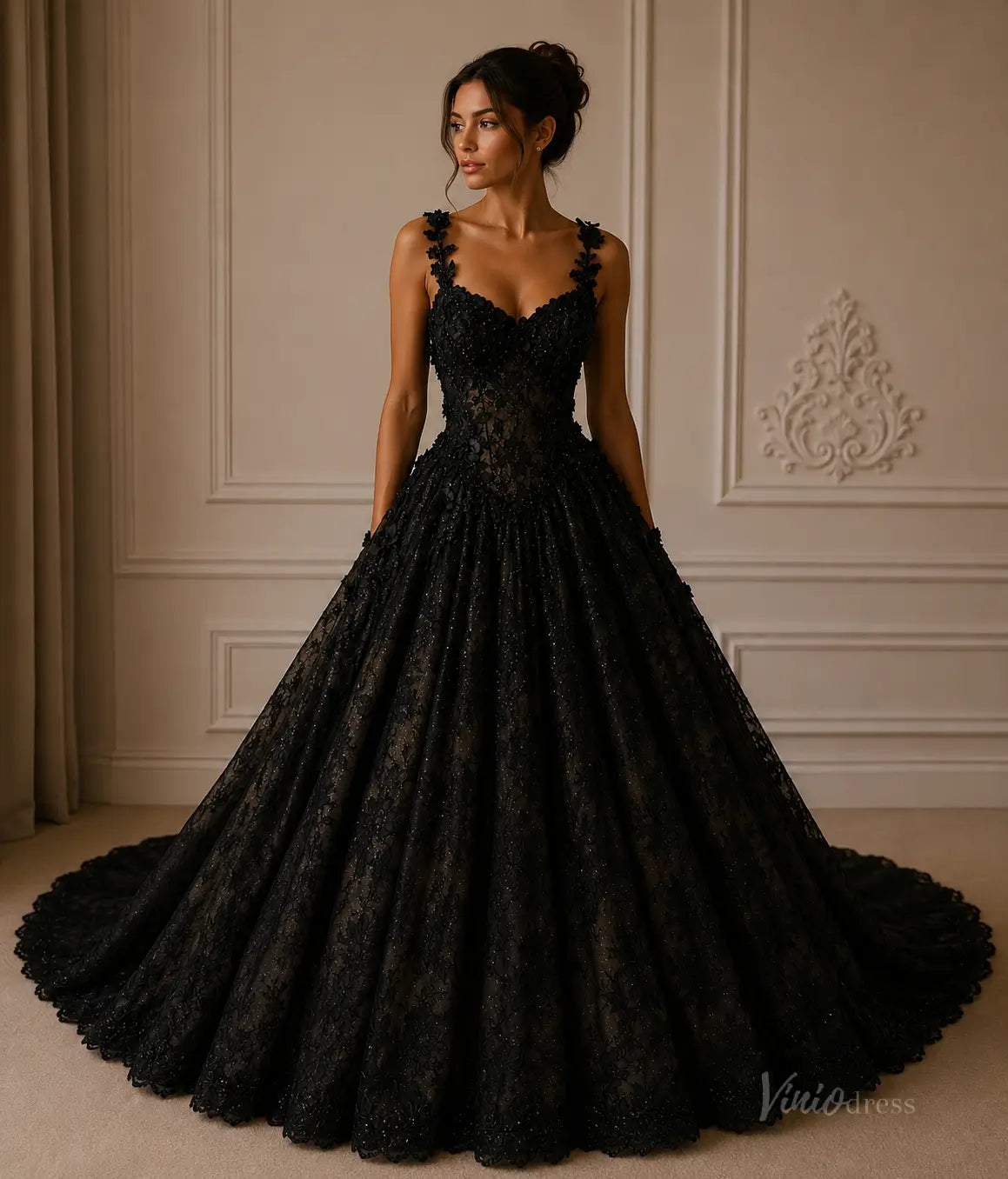 Black ball gown wedding dress with a sweetheart neckline, intricate lace bodice, floral straps, and a full, voluminous skirt.
