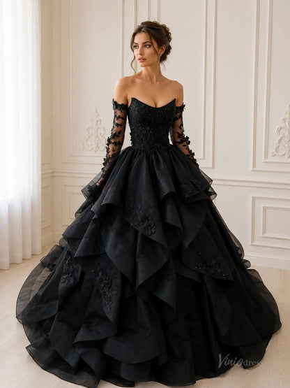Black off-the-shoulder ball gown with a tiered organza skirt, floral lace bodice, and long sheer sleeves.