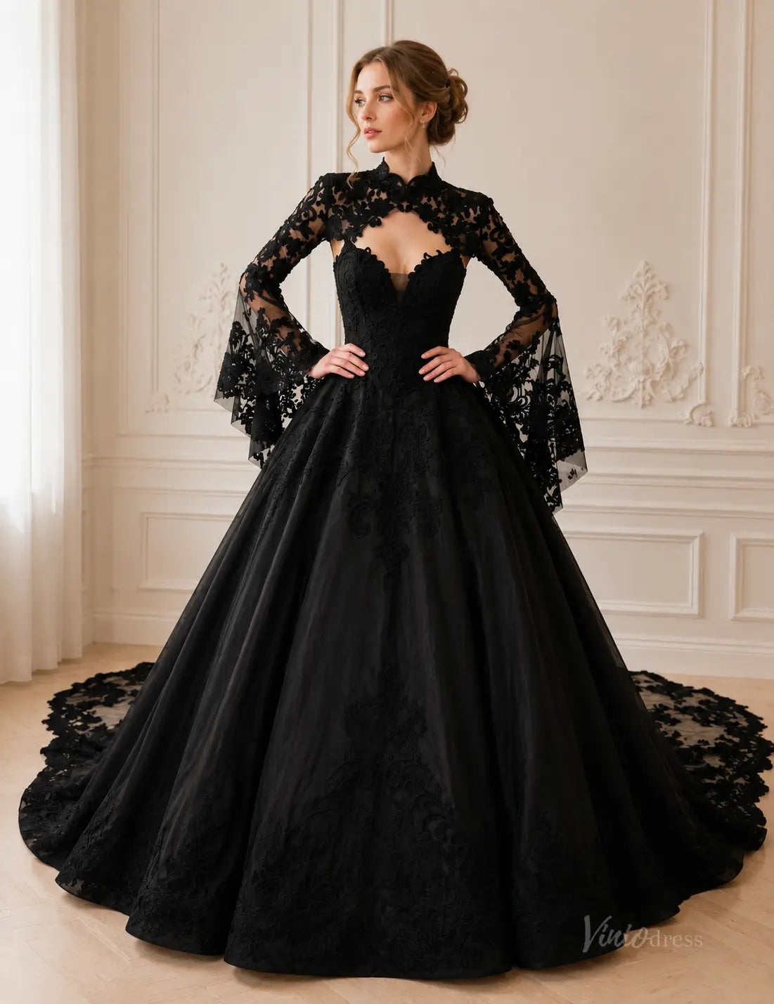 Black ball gown wedding dress with long lace bell sleeves, a high neckline, and intricate floral embroidery on a full skirt.
