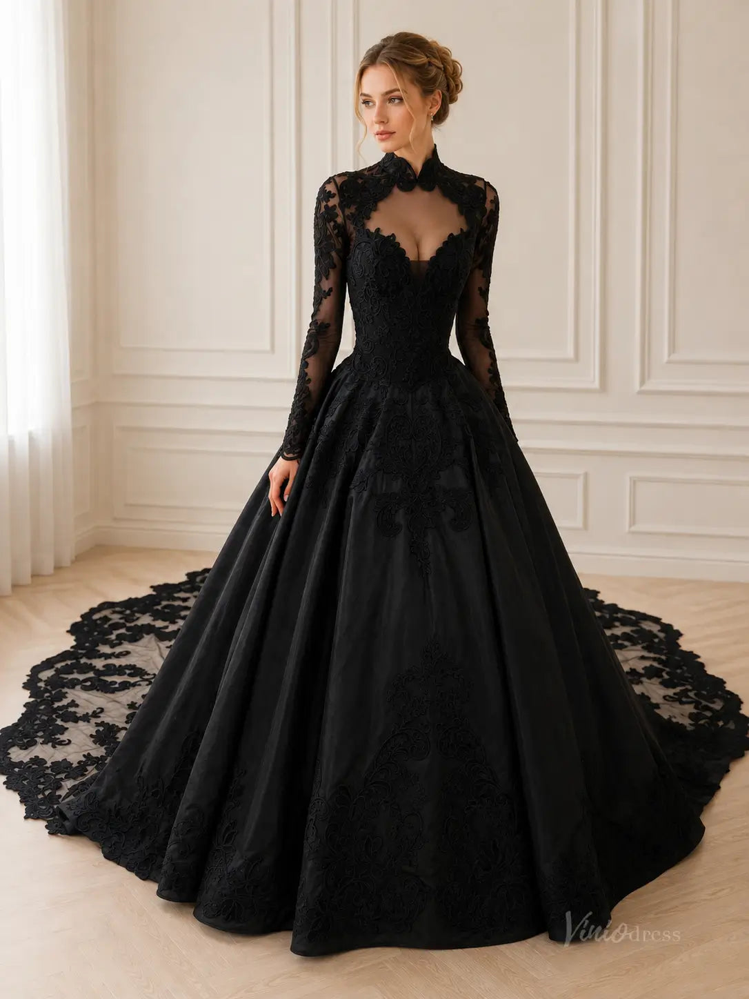 Black ball gown wedding dress with long lace sleeves, high neck, sweetheart bodice, and an intricate lace train.