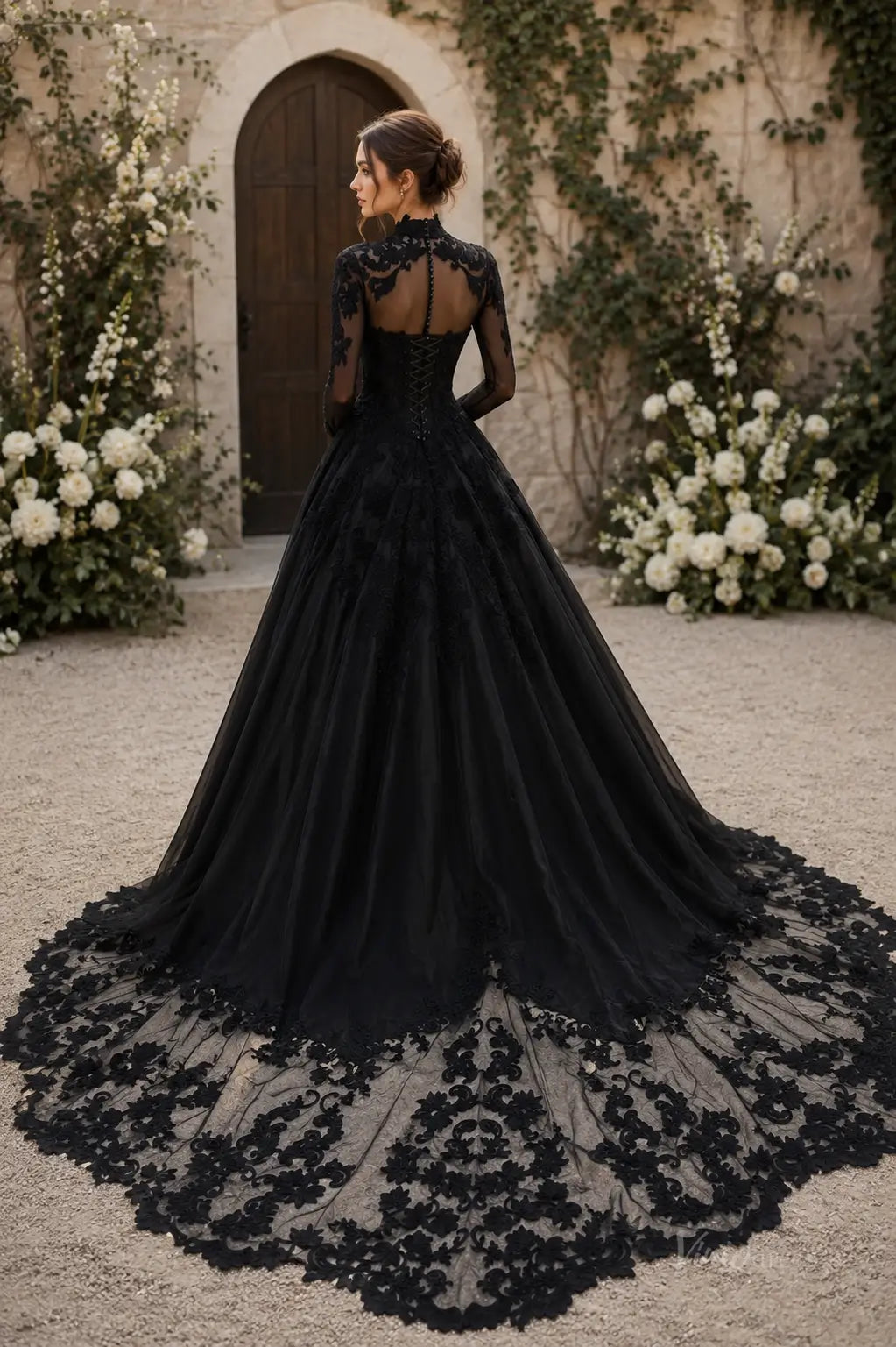 Black long-sleeve wedding dress with intricate lace detailing, high neckline, corset back, and a dramatic floor-length train.