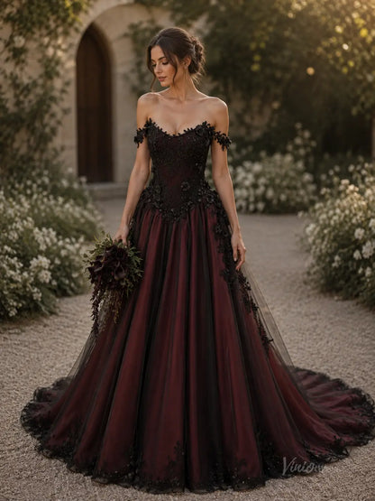 Off-the-shoulder ball gown in deep burgundy and black tulle with intricate lace appliqué and a full, flowing skirt.