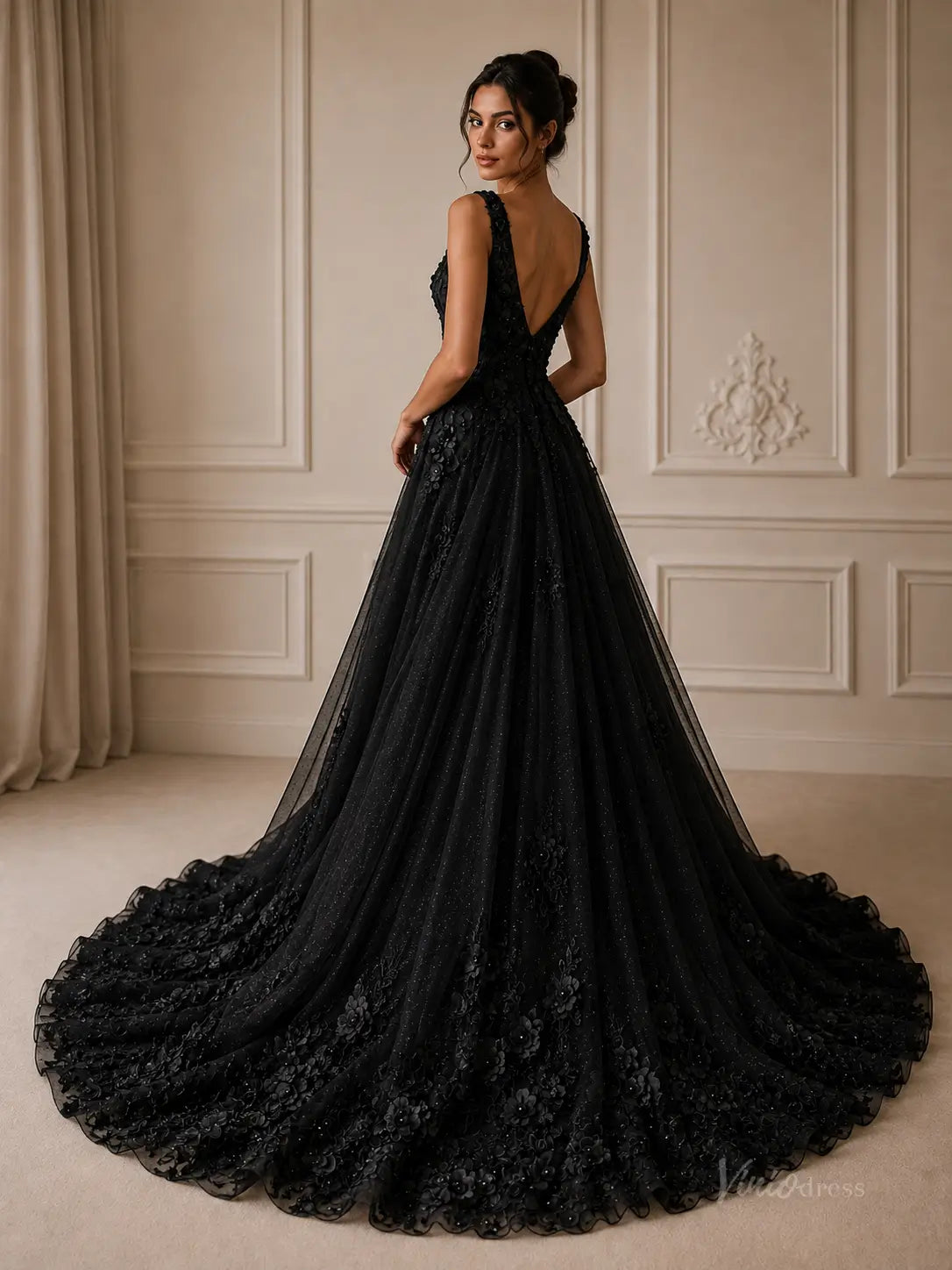 Black glitter tulle A-line wedding dress with 3D floral appliqué, deep V-back, and a dramatic chapel-length train.