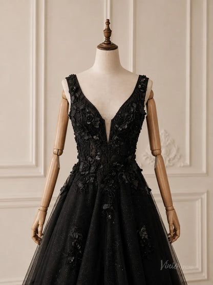 Black glitter tulle A-line wedding dress with deep V-neckline and 3D floral appliqué on a mannequin.