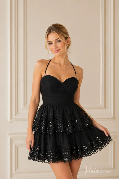 S26128 black halter neck mini dress with a sweetheart bodice and tiered sequin skirt.