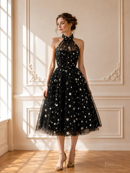 Black tea-length tulle prom dress with gold star embellishments, halter neckline, and a sheer illusion bodice.