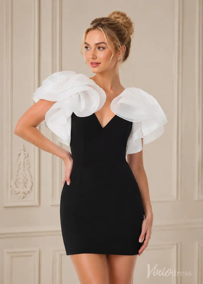 Black mini dress with white ruffled organza sleeves and a deep V-neckline, worn by a blonde woman.