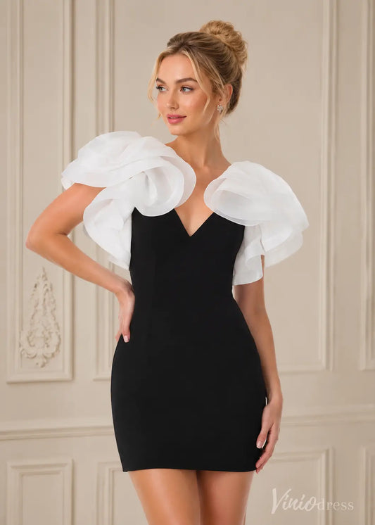 Black mini dress with white ruffled organza sleeves and a deep V-neckline, worn by a blonde woman.