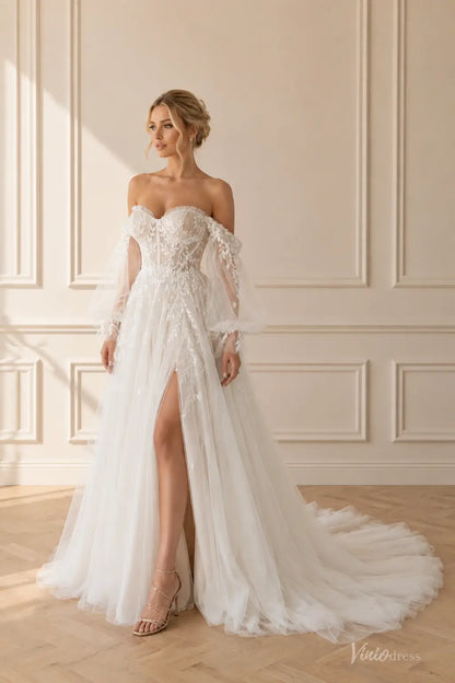 Boho wedding dress with puff sleeves, pleated bodice, floral lace appliqués, and a flowing A-line skirt with a high slit.
