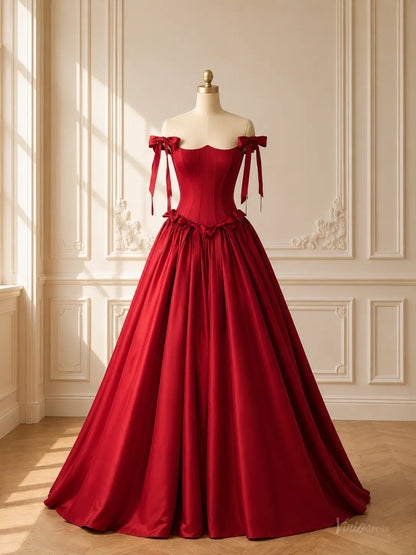 Burgundy satin ball gown with a corset bodice, basque waist, and off-the-shoulder bow straps on a dress form.