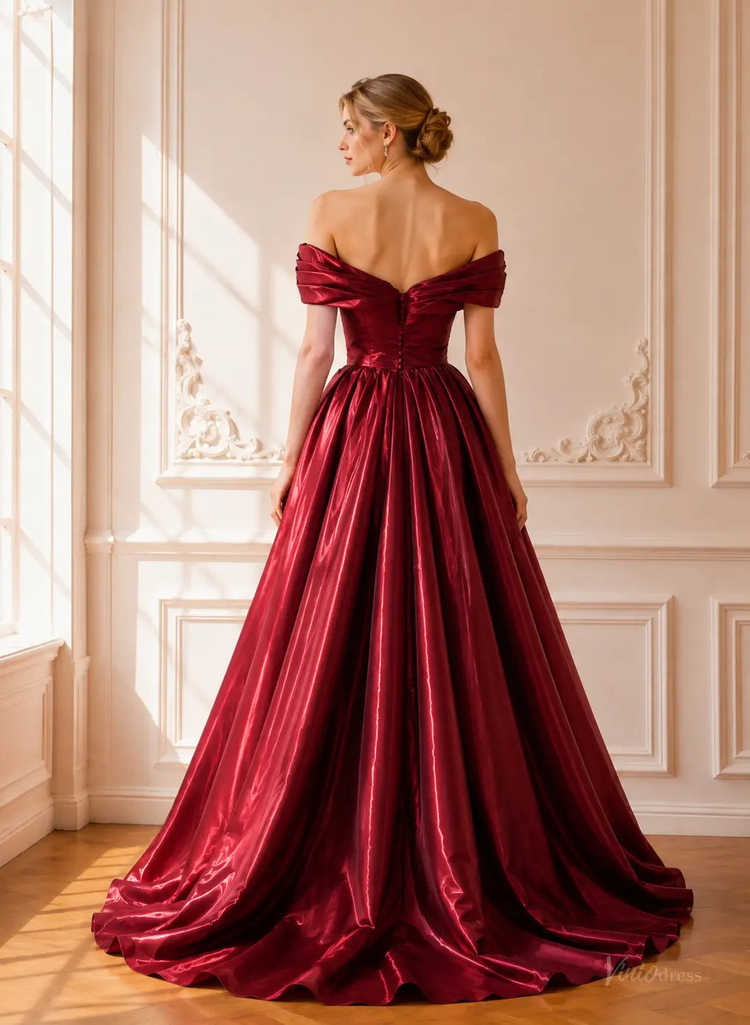 Burgundy satin ball gown with an off-shoulder draped bodice, button-back detail, and a voluminous pleated floor-length skirt.