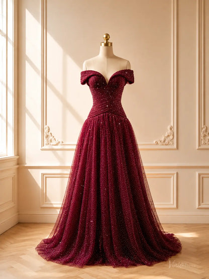 Burgundy sparkly tulle ball gown with an off-shoulder sweetheart neckline and ruched bodice on a mannequin.