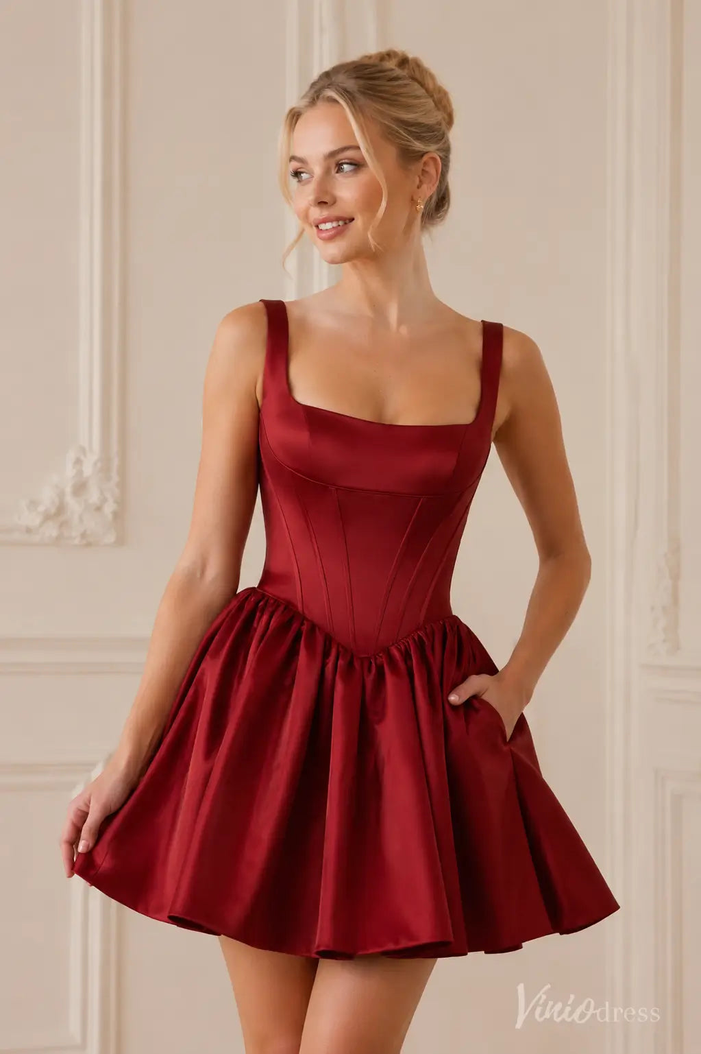 S26092 red satin mini dress with square neckline, structured bodice, full skirt, and pockets.