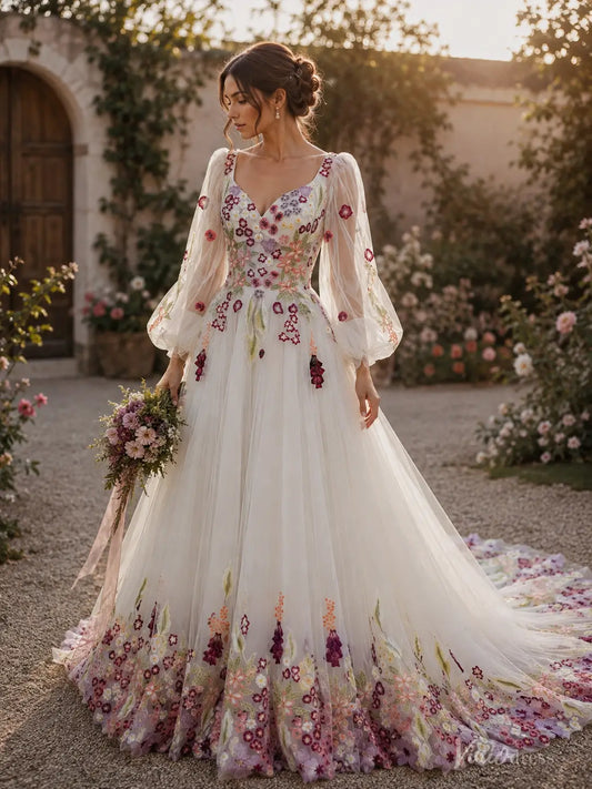Ivory tulle wedding dress with colorful floral embroidery, sheer long sleeves, sweetheart neckline, and a chapel train.