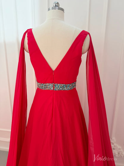 Crimson red chiffon pageant gown with V-neck, dramatic cape sleeves, and a beaded waistline on a dress form.