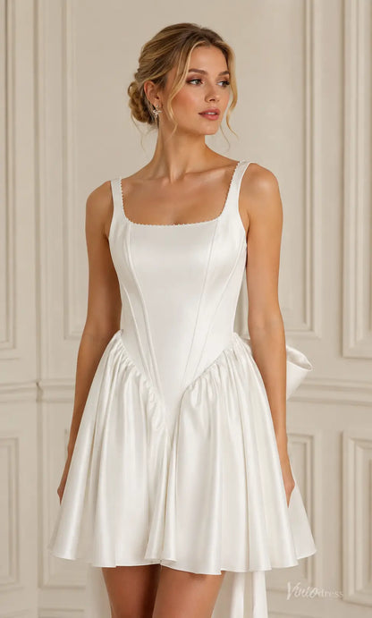 White satin mini wedding dress with a square neckline, corset-style bodice, and pleated skirt.