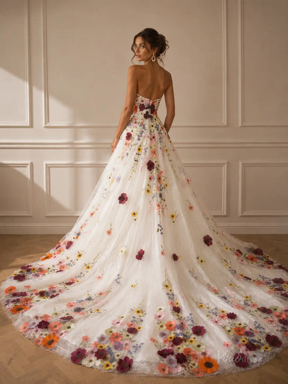 Strapless A-line wedding dress with a long train, featuring colorful 3D floral embroidery on white tulle fabric.