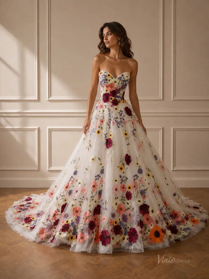 Strapless white ball gown featuring a sweetheart neckline and vibrant, multi-colored 3D floral embroidery throughout.