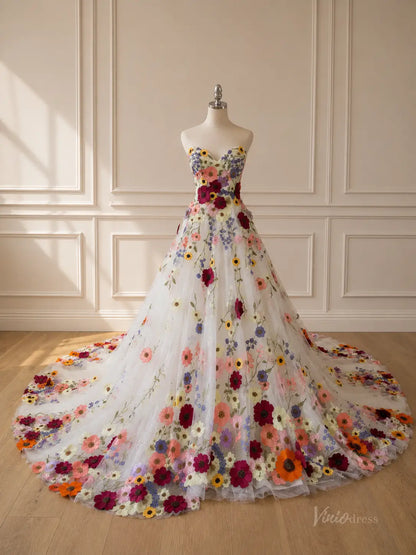 Strapless white ball gown featuring a full skirt and bodice adorned with vibrant, multicolored 3D floral appliqués.