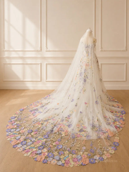 Floor-length bridal veil in sheer white tulle featuring colorful 3D floral embroidery and a dramatic sweeping train.