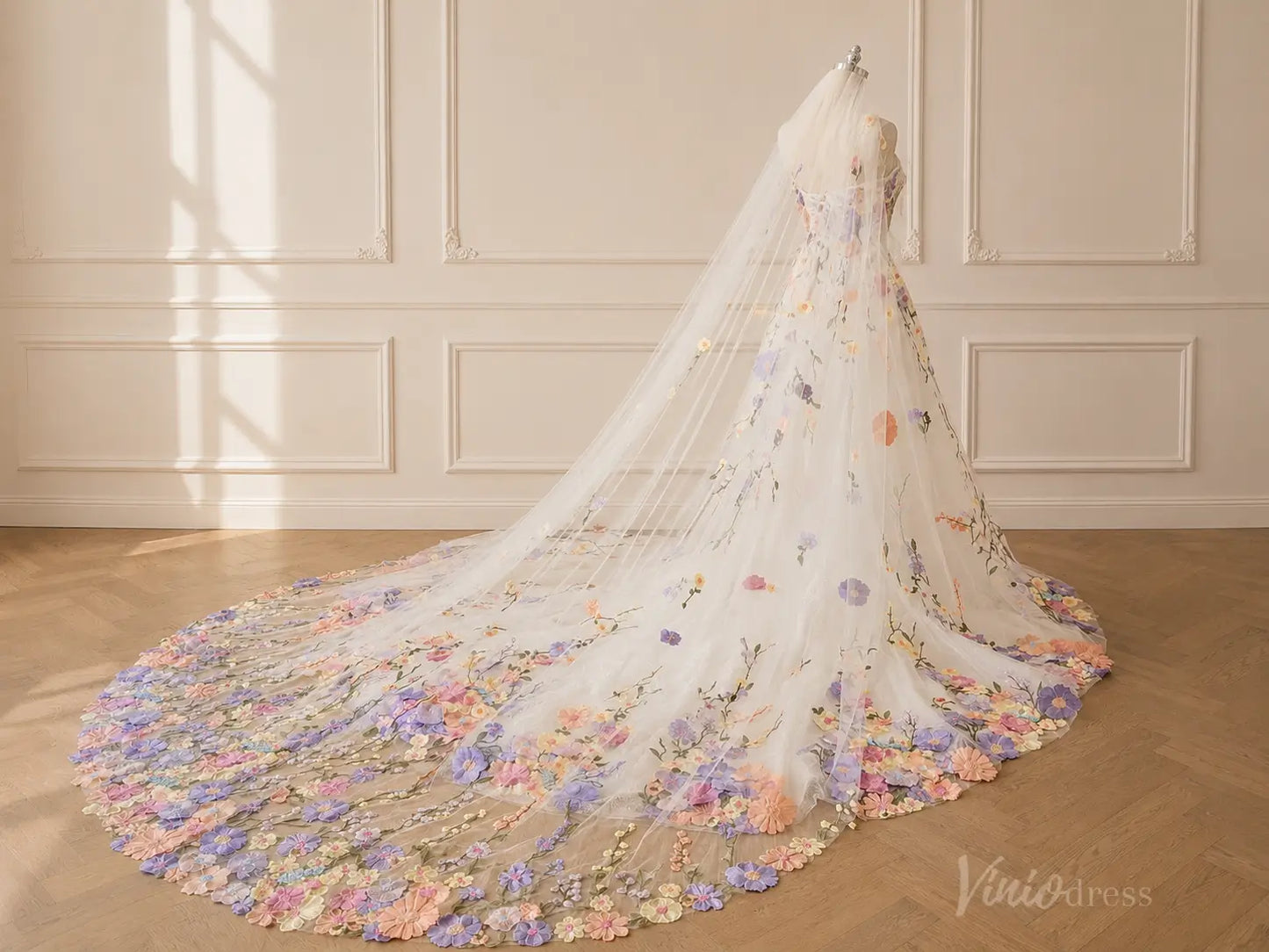 A-line wedding dress FW297 featuring a long tulle train with colorful 3D floral embroidery and a matching sheer veil.