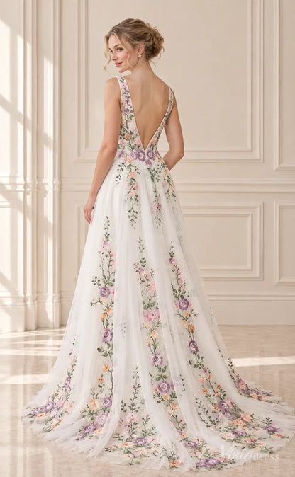 A-line wedding dress featuring colorful floral embroidery, a deep V-back, and a sweeping tulle train with trailing vines.