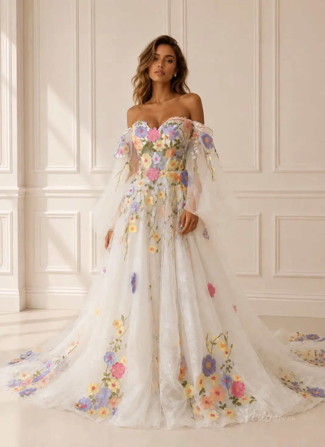 Off-the-shoulder A-line wedding dress with sheer puff sleeves and colorful 3D floral embroidery on white tulle.