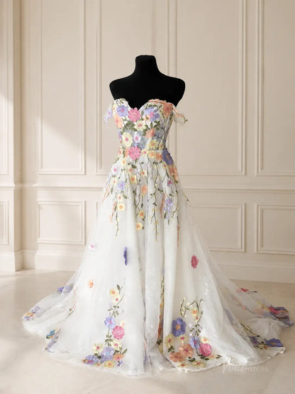 Off-the-shoulder A-line wedding dress in white tulle featuring colorful 3D floral embroidery and a sweeping train.