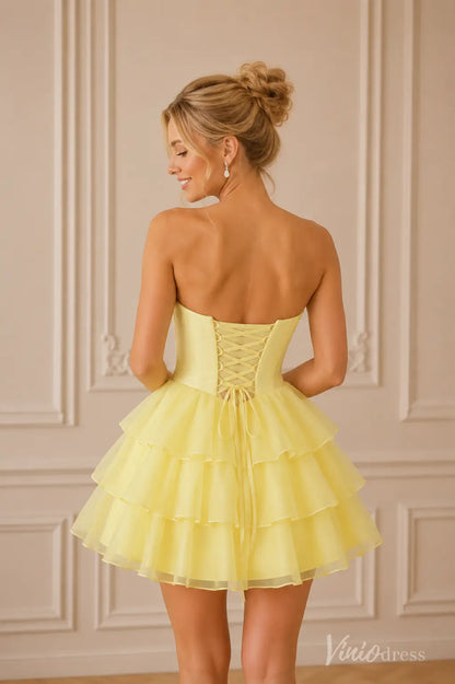 Yellow strapless short dress with a lace-up corset back and tiered ruffle skirt.