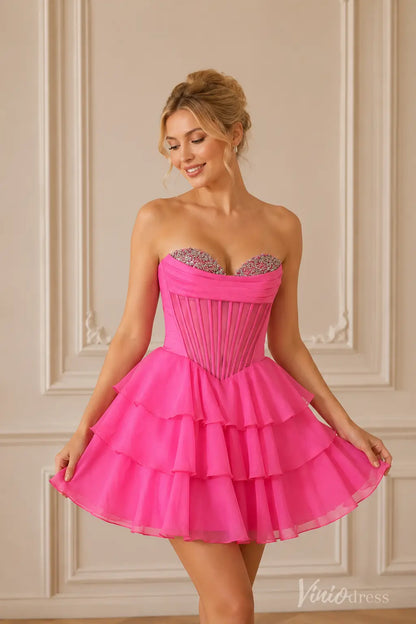 Hot pink strapless corset dress with beaded sweetheart neckline and ruffled skirt.