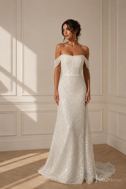 Off-the-shoulder white sequin wedding dress with a fitted bodice and a subtle train in a classic bridal style.