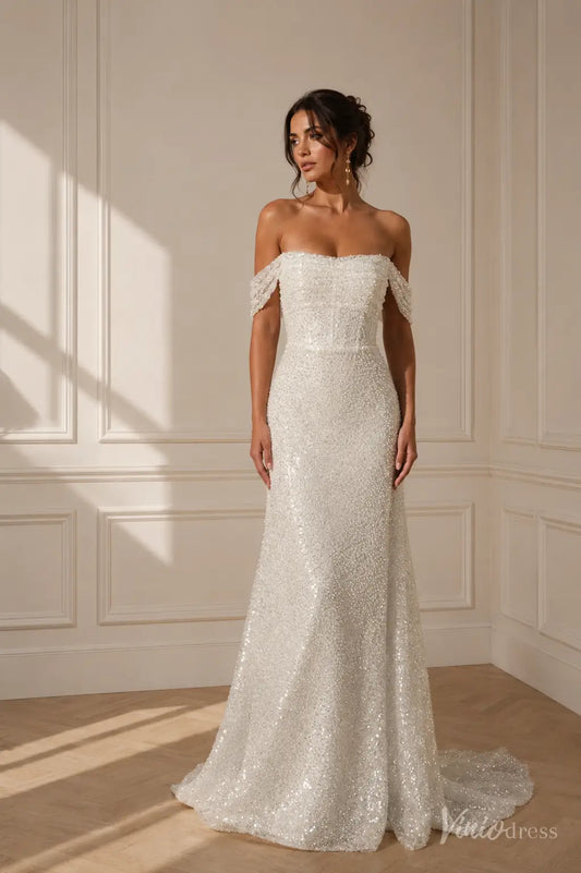 Off-the-shoulder white sequin wedding dress with a fitted bodice and a subtle train in a classic bridal style.