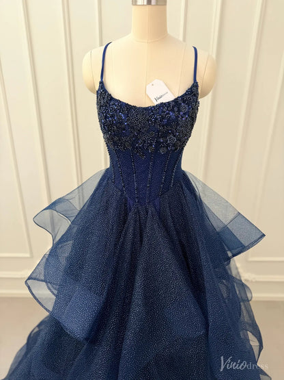 Navy blue glitter tulle prom dress with a beaded corset bodice and a dramatic tiered ruffle ball gown skirt.