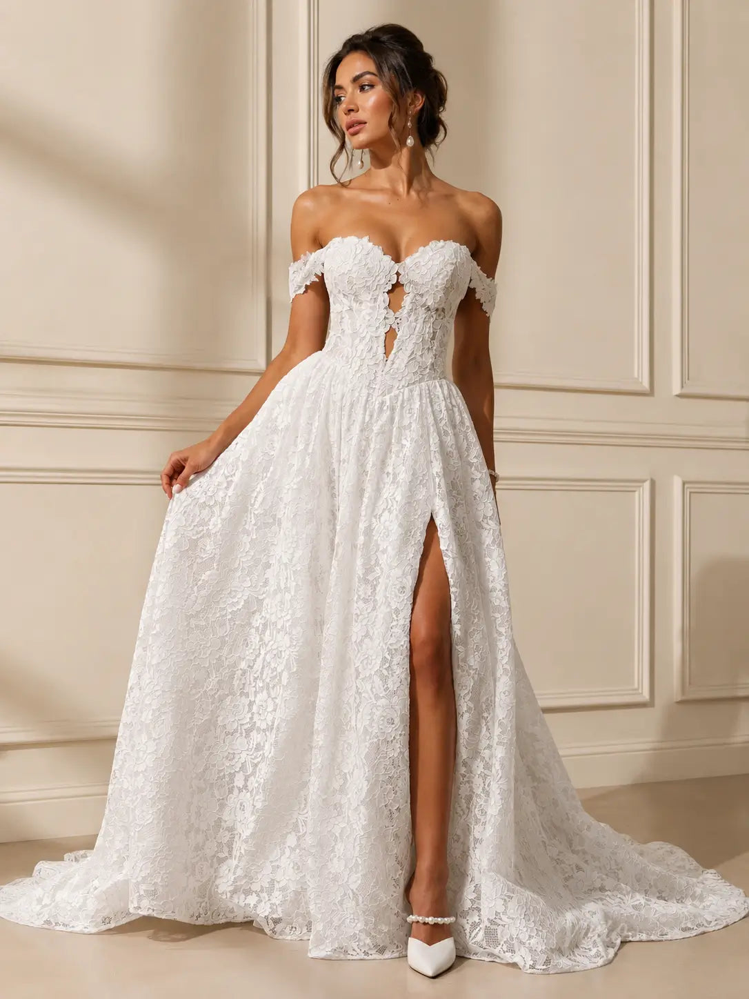 White lace wedding dress with off-the-shoulder neckline, sweetheart bodice, and high leg slit in an A-line silhouette.