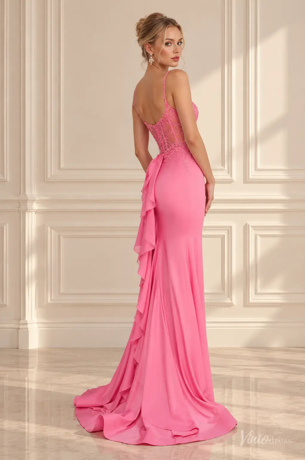 Pink satin mermaid prom dress with lace corset bodice, spaghetti straps, and cascading back ruffles.
