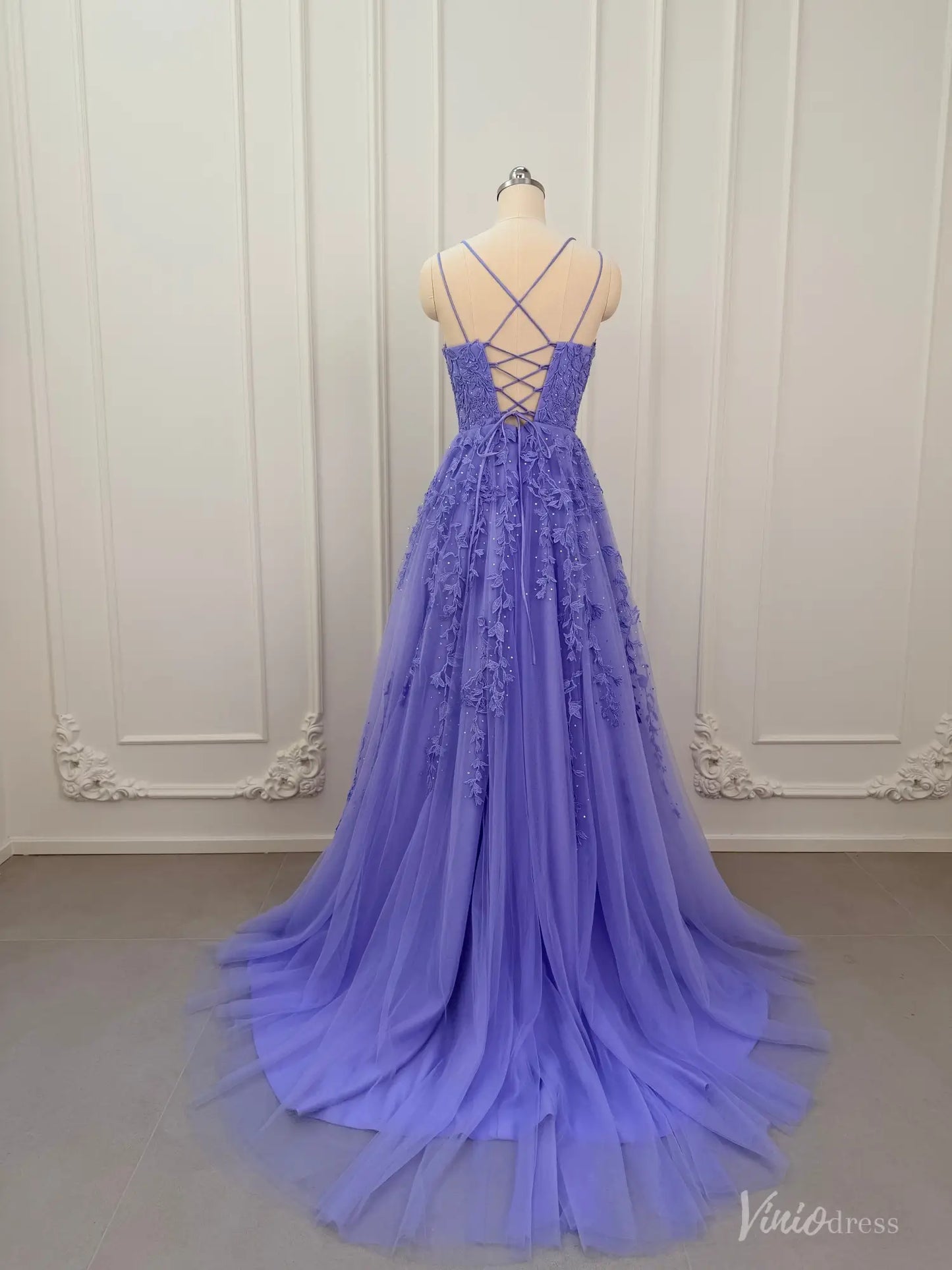 Lavender A-line prom dress with floral appliqué, tulle skirt, and corset lace-up back on a mannequin.