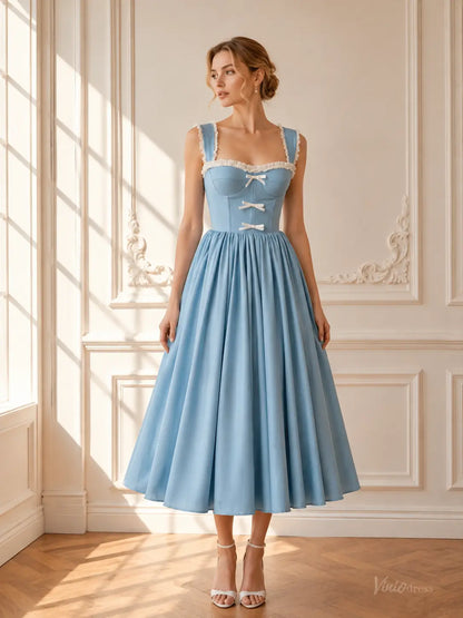 Light blue tea-length prom dress with a corset bodice, white ruffle trim, and delicate bow details.