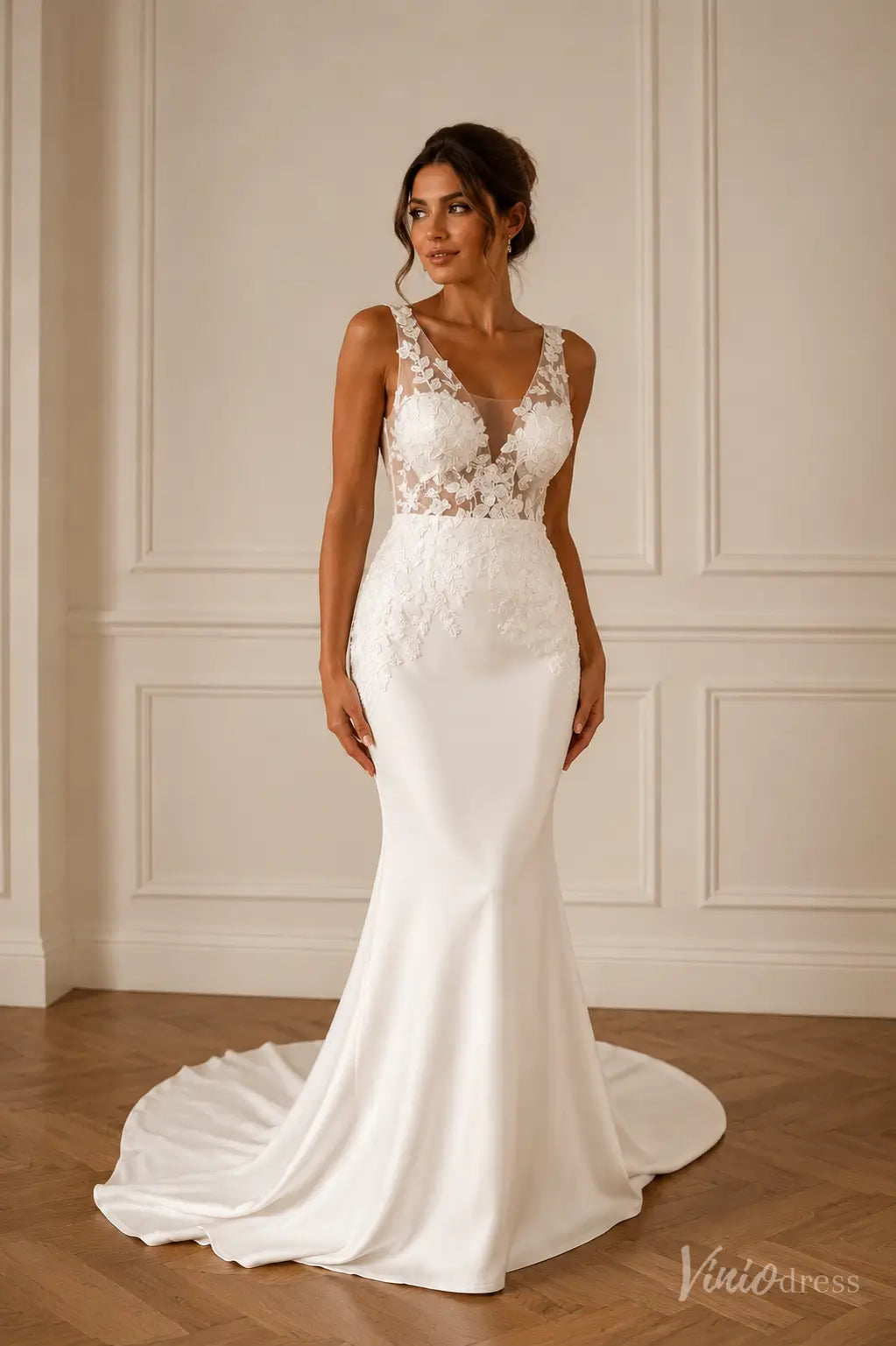 ML191 white mermaid wedding dress with a sheer illusion bodice, floral lace appliques, and a sleek satin skirt.