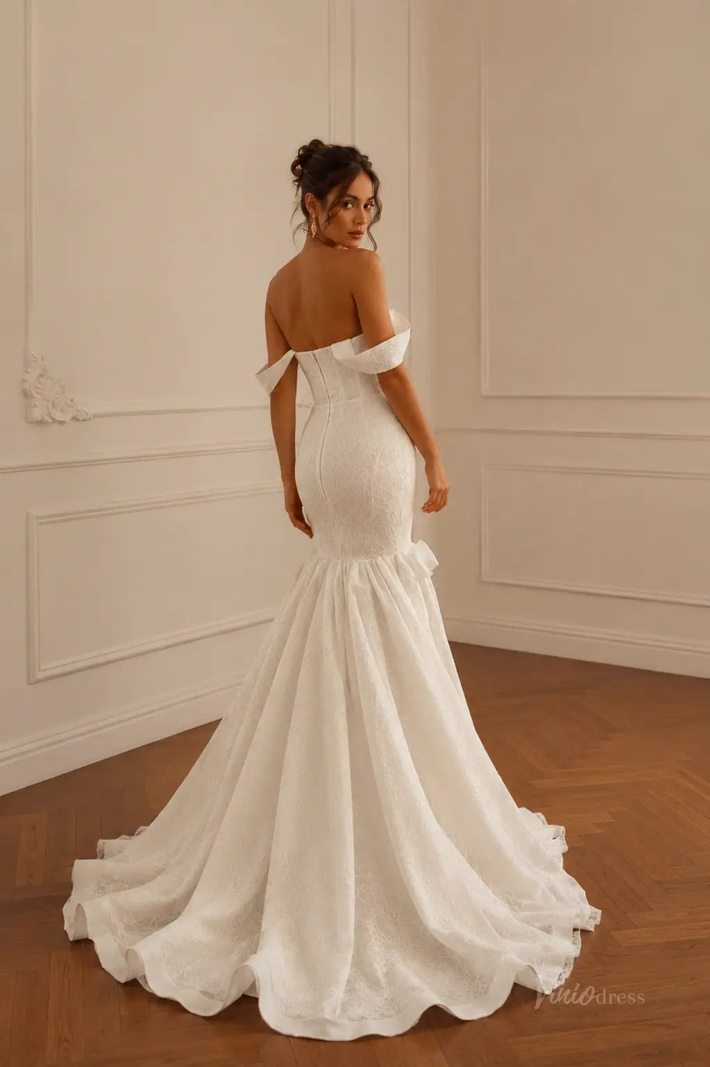 ML193 white lace mermaid wedding dress with an off-the-shoulder neckline and a dramatic flared train.