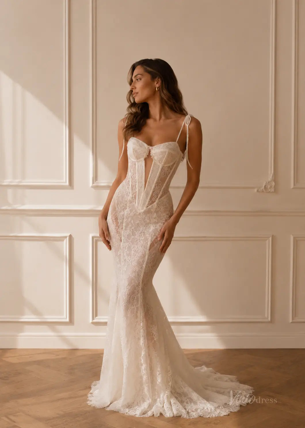 ML195 white lace mermaid wedding dress with a corset-style bodice, sweetheart neckline, and delicate tie-up straps.