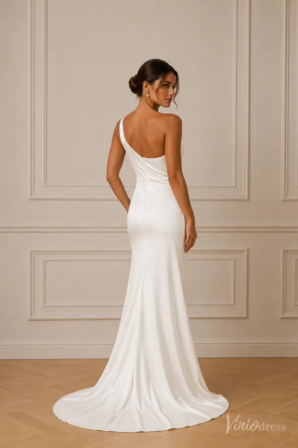 MN173 white satin mermaid wedding dress featuring a sleek one-shoulder neckline and a floor-length train.