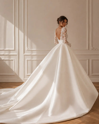 MS189 white satin ball gown wedding dress with long lace sleeves, an open back, and a dramatic floor-length train.