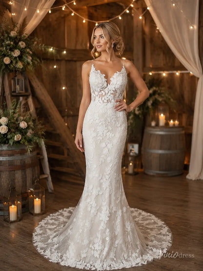 Ivory mermaid wedding dress with 3D floral lace, deep V-neckline, spaghetti straps, and a romantic lace train.