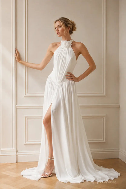 White chiffon A-line beach wedding dress featuring a halter neckline with floral detail and a high leg slit.