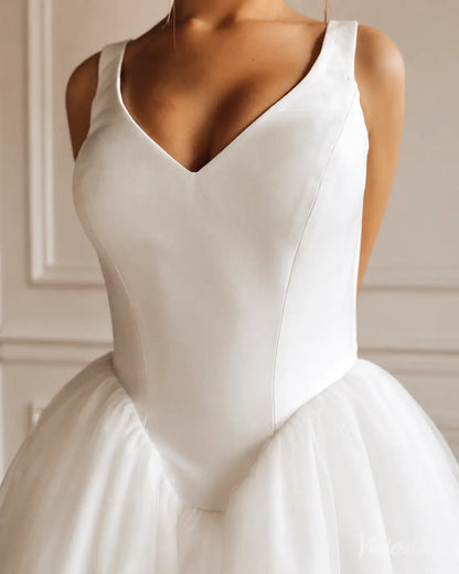 MS172 white bridal gown featuring a structured V-neck bodice and a voluminous layered tulle skirt.